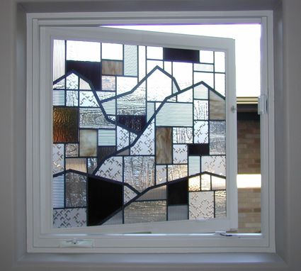 Custom Made Stained Glass In A Window That Opens