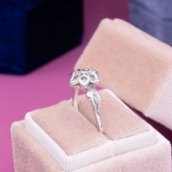 A simple, geometric design and all white color scheme give this Nenya inspired ring a unique twist.