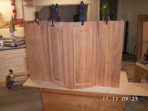 Custom Made Built In Frame And Panel Barrel Doored Cabinet