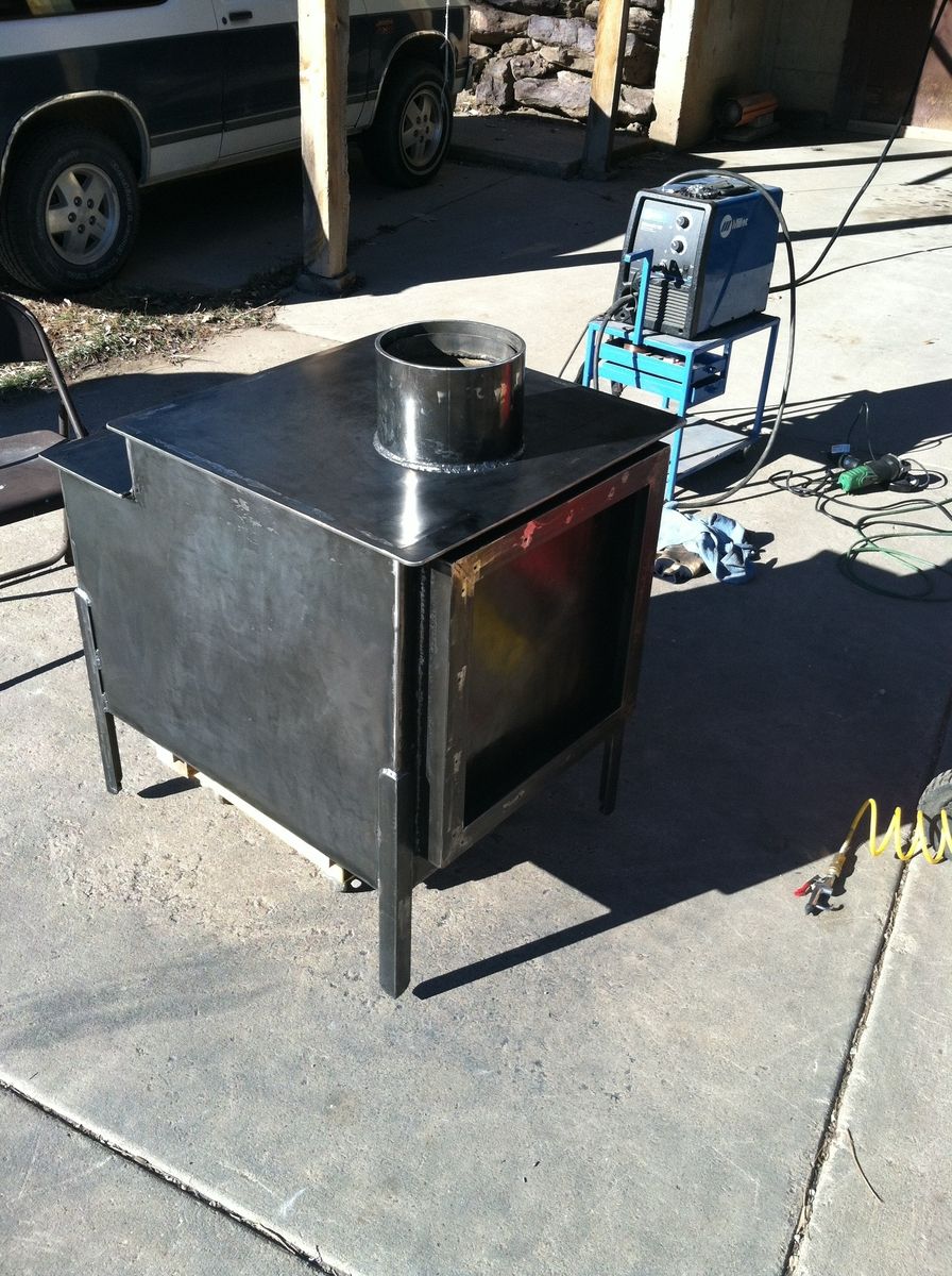 Hand Crafted Wood Stove by Crossroads Concrete