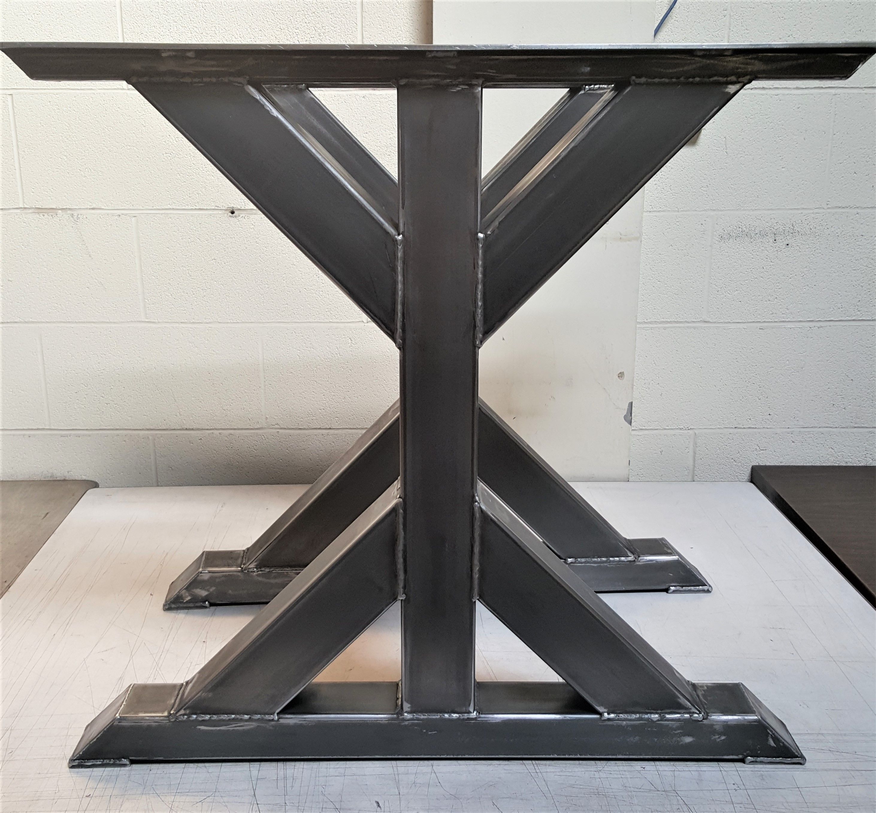 Hand Crafted Trestle Table Legs by DVA Metal Ltd.