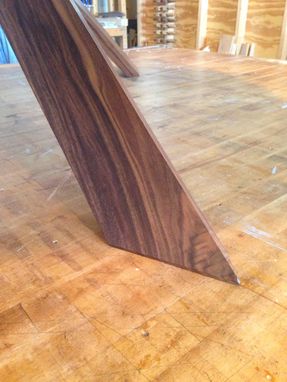 Custom Made Puzzle Leg Dining Table In Walnut