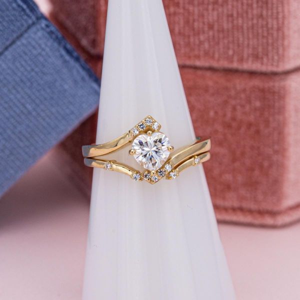 This heart shaped moissanite speaks the language of love in this engagement ring.