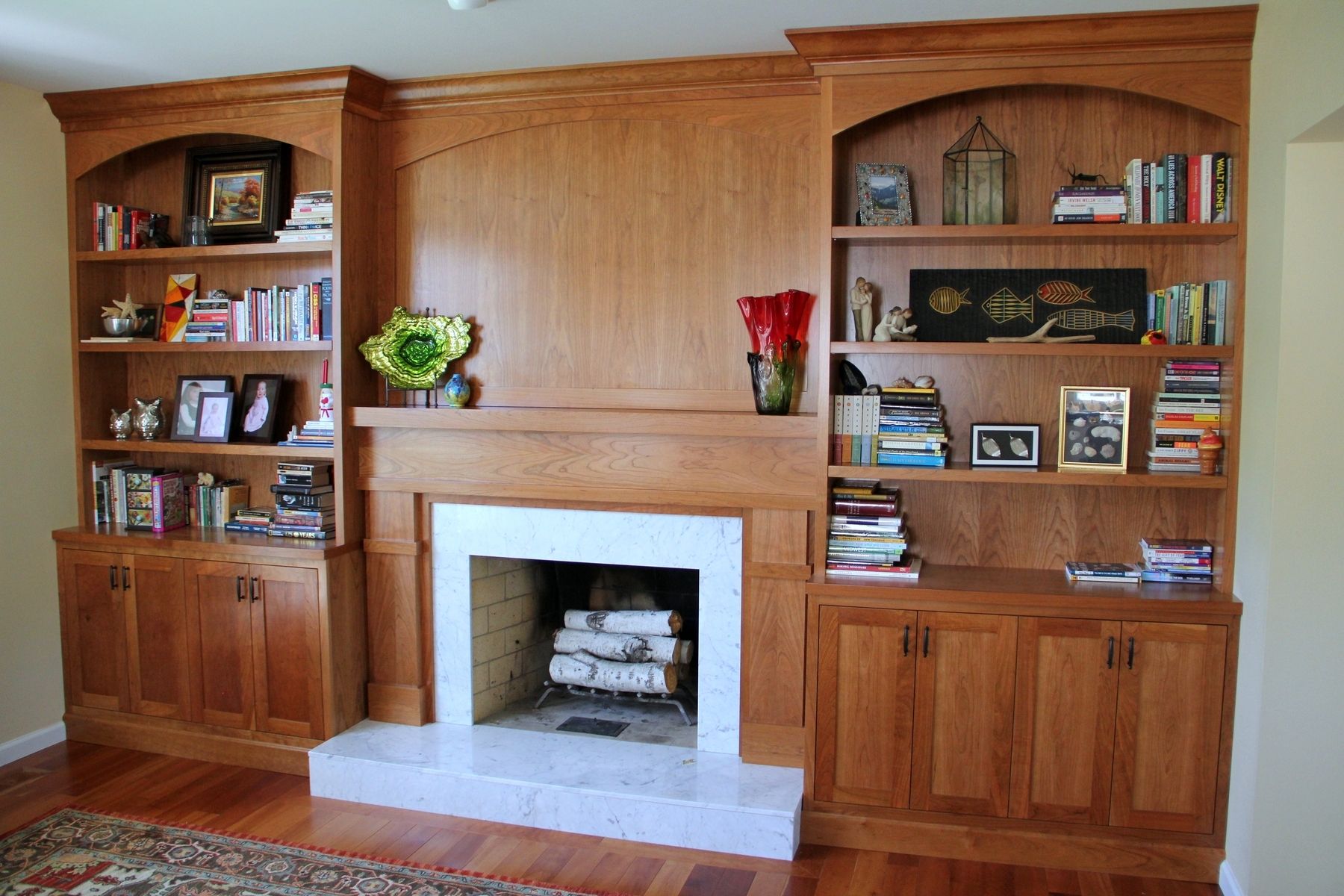 Built In Bookshelf Around Chimney In Dining Room