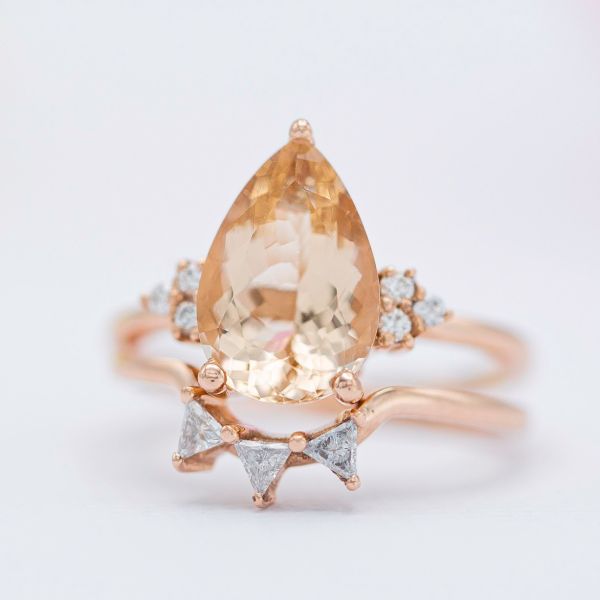 This peach colored pear shape morganite is 11.75x8mm and weighs in at 2.74cts.