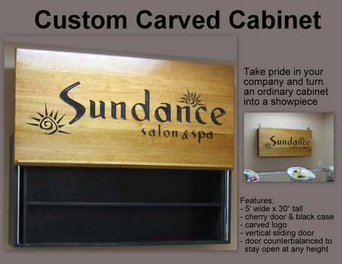 Custom Made Commercial Cabinet With Carved Logo