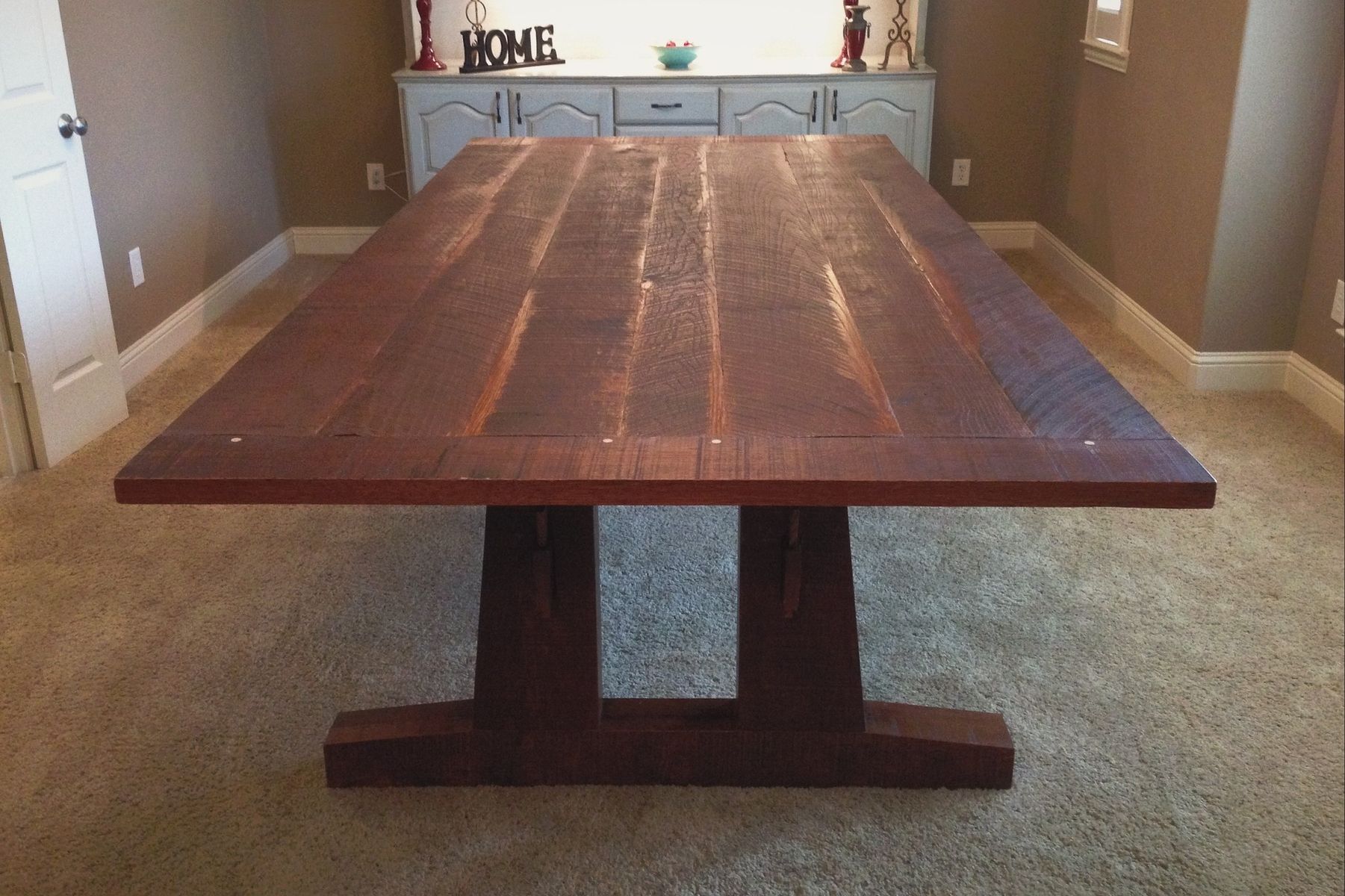 oak kitchen table in a white kitchen