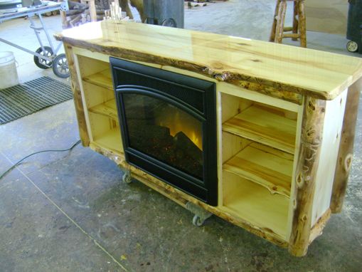 Custom Made Aspen Log Tv Stand With A Built In Electric Fire Place