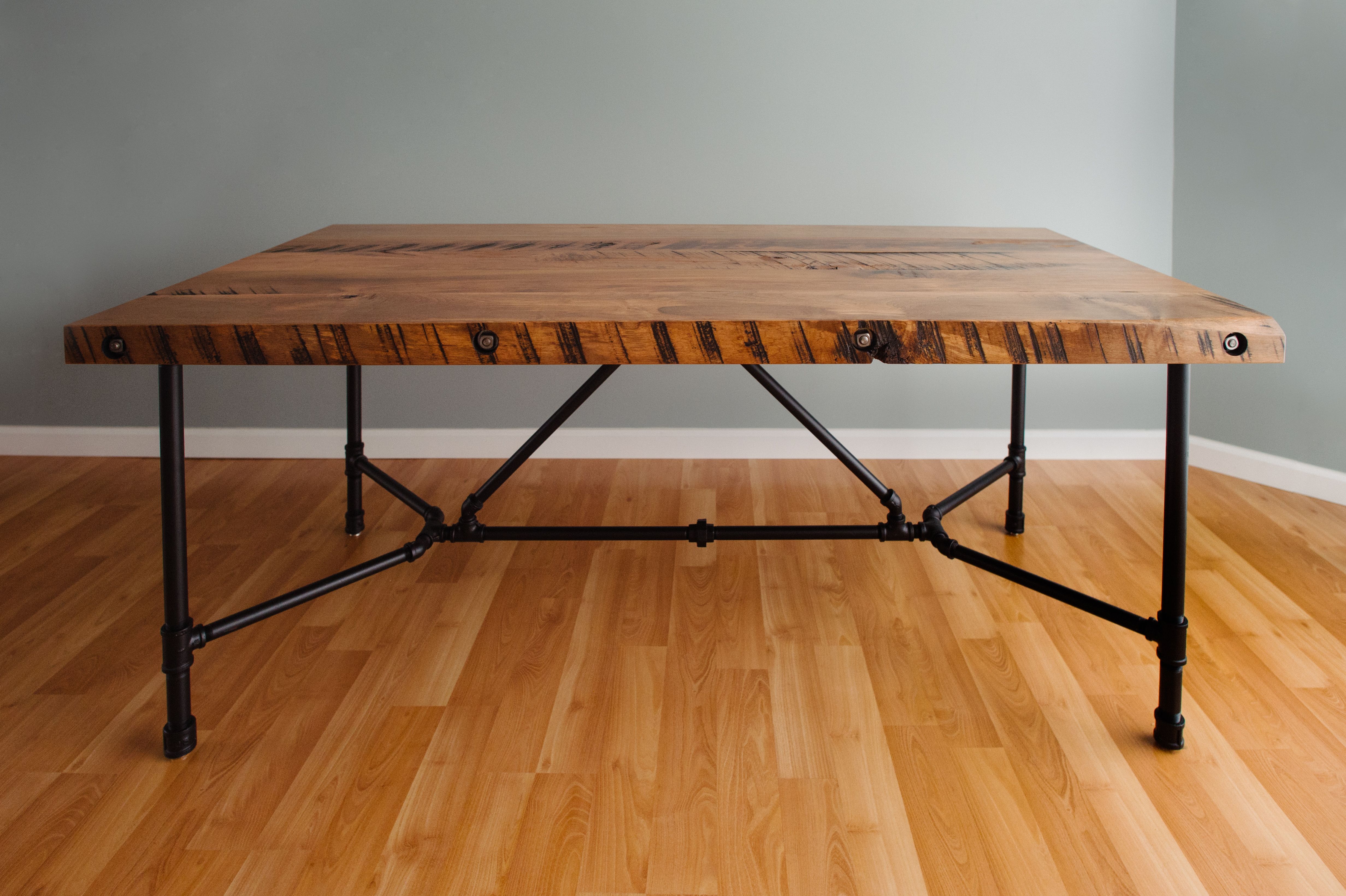 Handmade Pipe Leg Dining Table With Reclaimed Wood Top by Monongahela Manufacturing