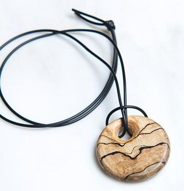 Custom Made Pendants, Jewlery, Necklaces, Earrings, Head Wear All From Wood, Stone And Other Exotic Materials.