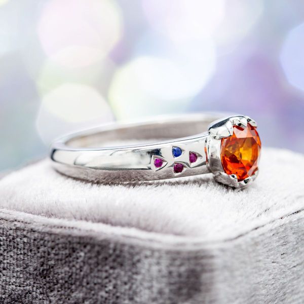 Rubies and sapphires add lots of color to this Pokemon inspired ring.