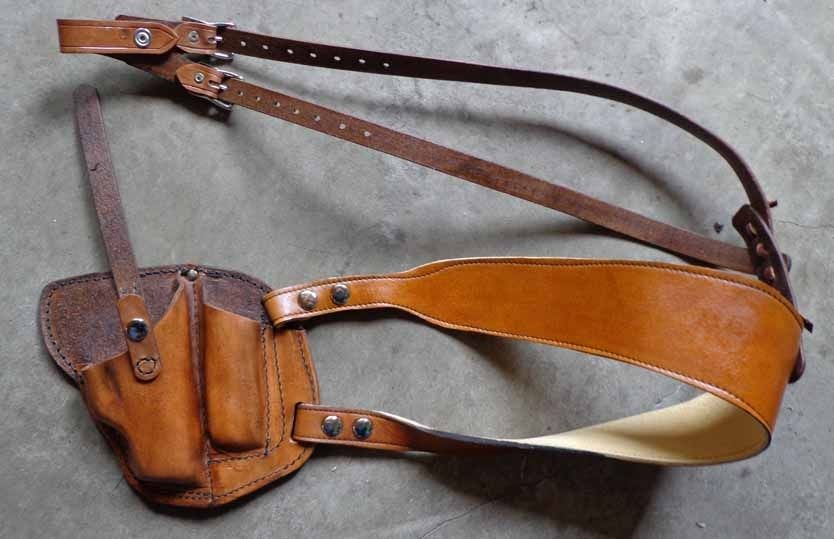 Handmade Gun Holsters by The Water Hole Custom Leather Inc