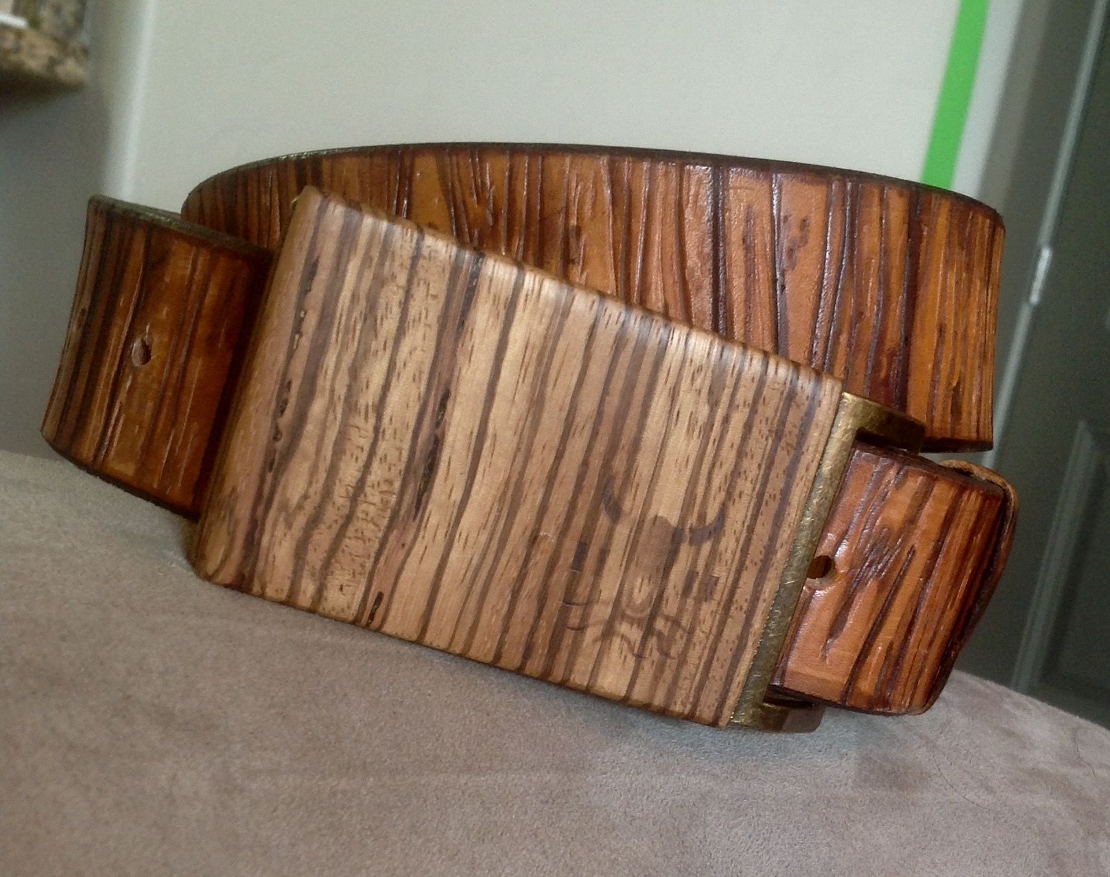 Buy Custom Made Wood Grain Leather Belts, made to order from Saxon Leather art