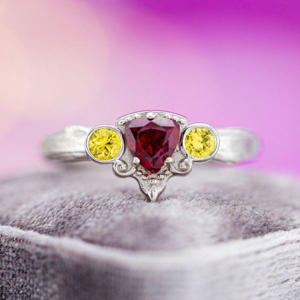 Vintage appeal charms us in this trillion cut ruby engagement ring inspired by Jojo’s Bizarre Adventure.
