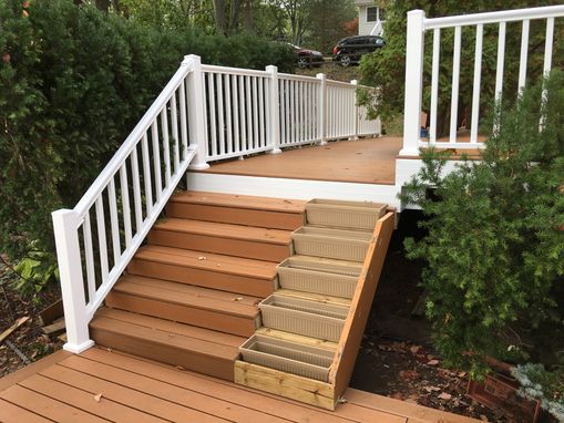 Custom Made Original Decking On A Three Tier Deck Replaced With Composite Decking