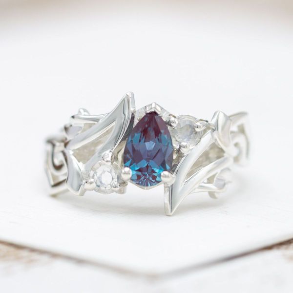 Sure to get a WoW, this World of Warcraft inspired ring features an alexandrite and sweeping lines resembling Illidan’s warglaives.