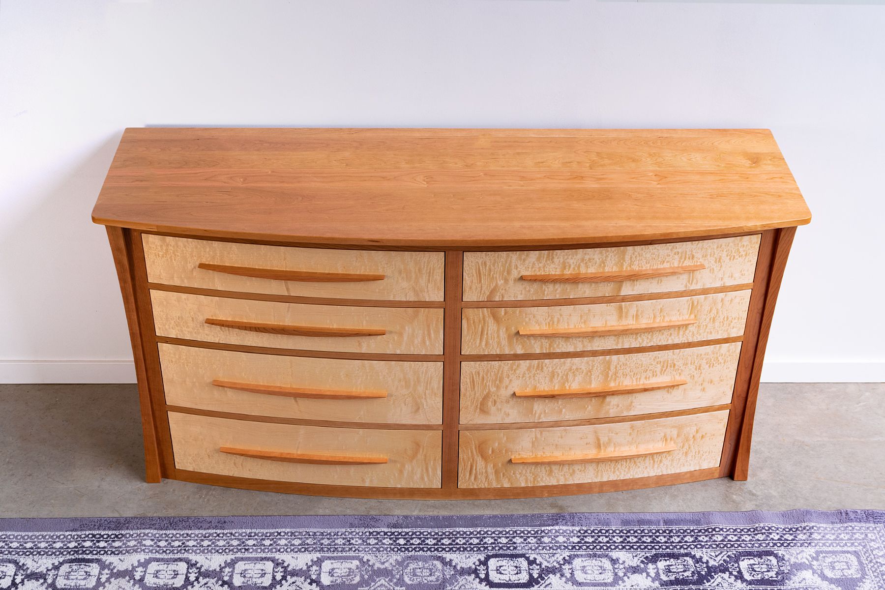 Hand Crafted Curved Front Dresser In Cherry And Curly Maple "Savanna" by Nathan Hunter Design