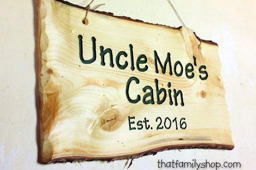 Custom Made Engraved Sign On A Rustic Slab Of Natural Wood