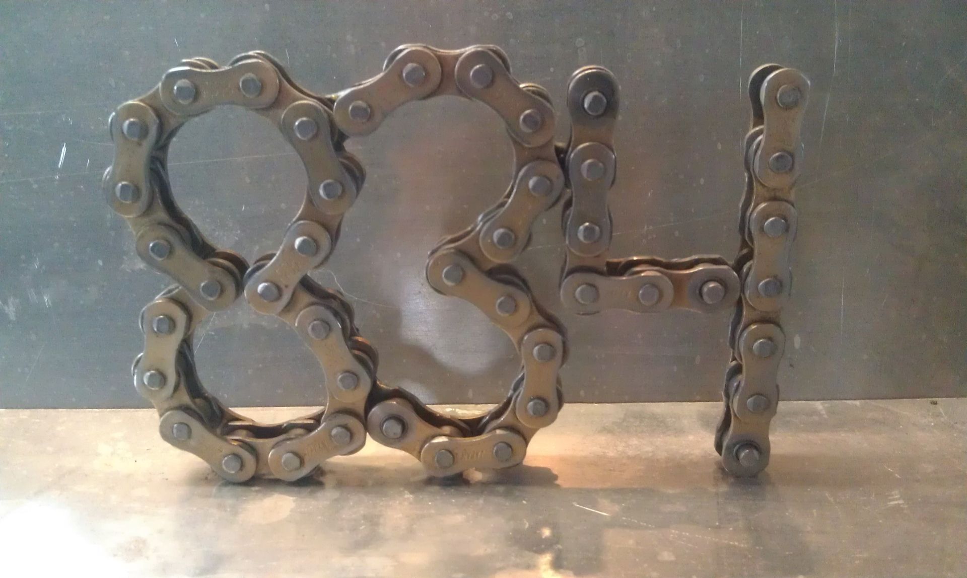 Hand Made Chain Numbers by Moto Metal Fab
