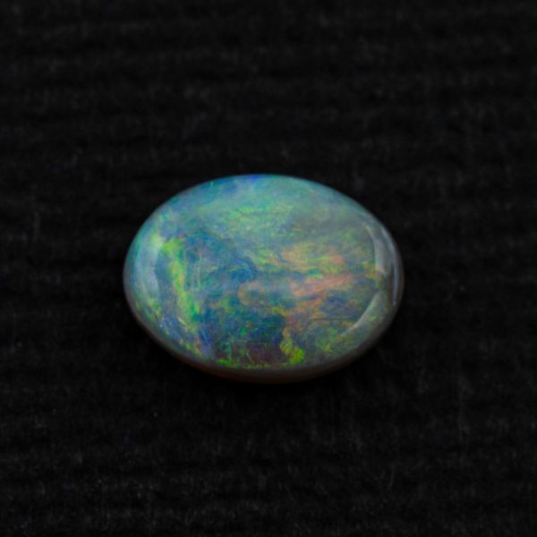 Most important for picking the perfect opal: high quality photos show every detail of the opal's color, and the way it changes with different angles and backgrounds.