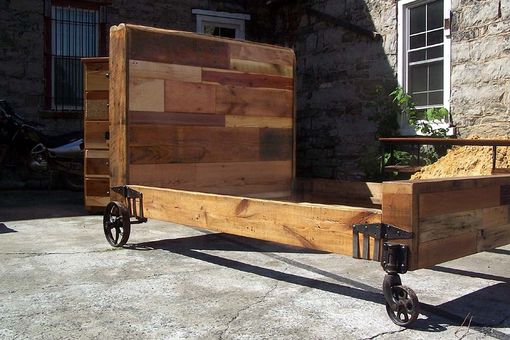 Custom Made Steampunk Bed From Reclaimed Wood And Vintage Iron Wheels