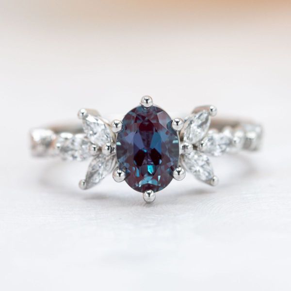 The blues of this alexandrite pop in this oval cut.