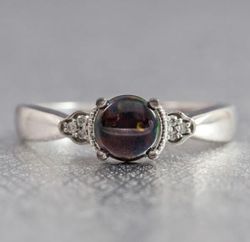 vintage-inspired black opal engagement ring