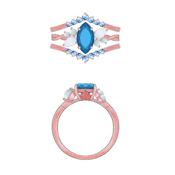 We could swim all day in the blue topaz of this mermaid inspired engagement ring