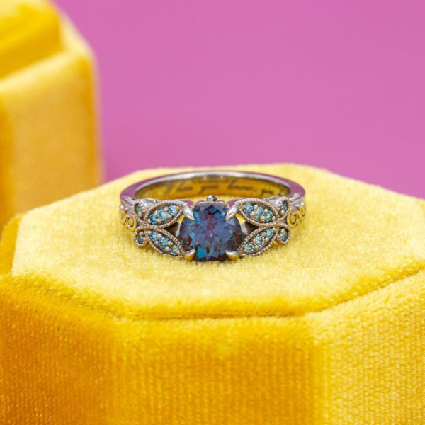 Alexandrite, blue diamond, and sapphire paint a rainbow of color in this butterfly engagement ring.