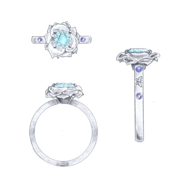 Butterflies play amongst amethyst accents around a lab-created diamond in this butterfly inspired engagement ring.