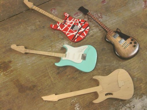 Custom Made Guitar And Bass Replicas
