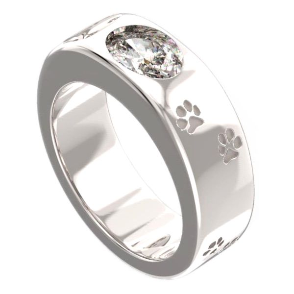 Paw prints rove along matching engagement rings with opposite center stones: a sparkling diamond in one and a deep black onyx in the other.