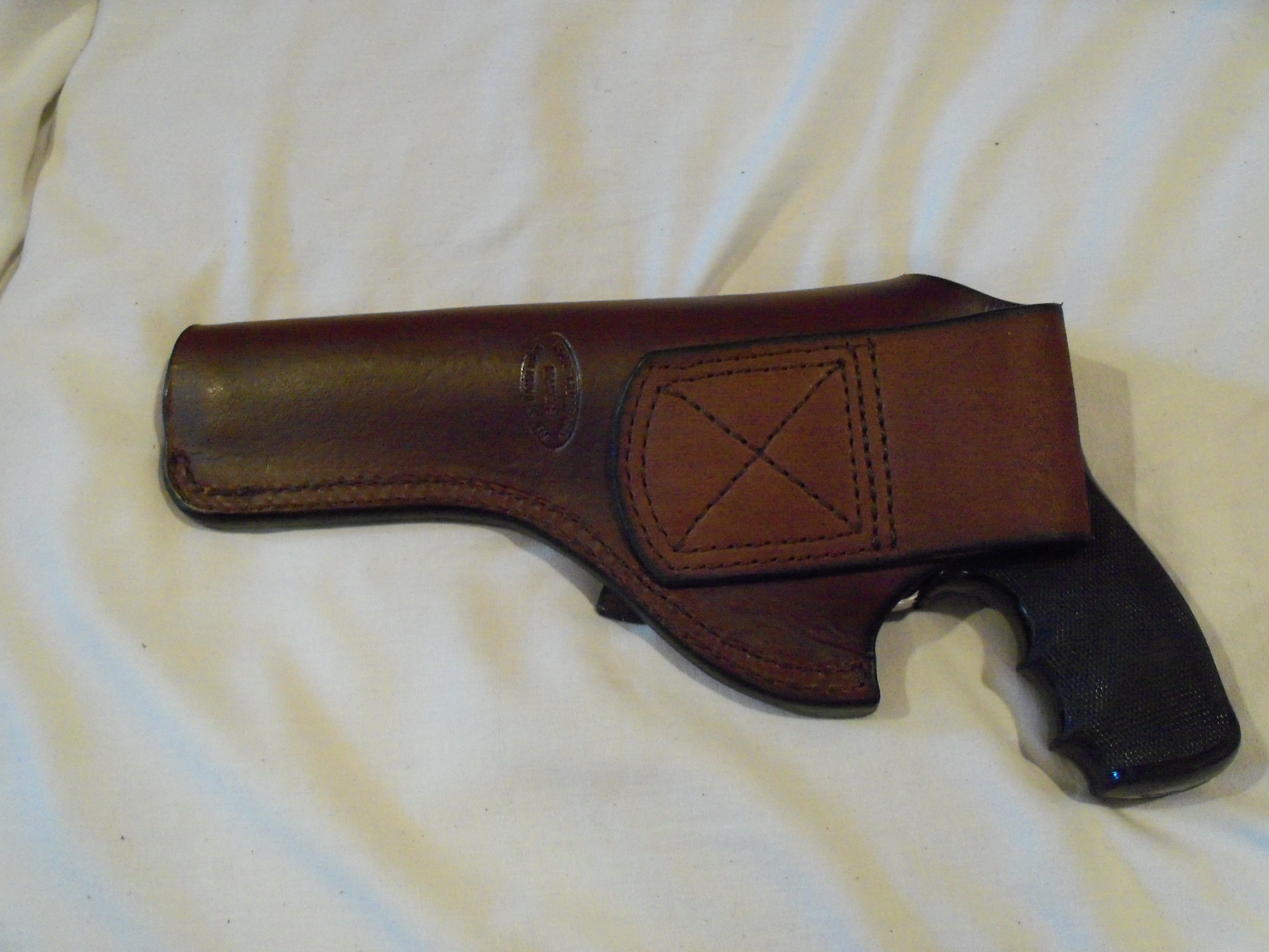 Custom Pistol & Revolver Holsters by Hubbard Leather | CustomMade.com