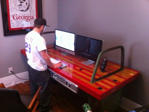 Custom Made Desk Made Of Old Truck Doors And Reclaimed Gym Flooring