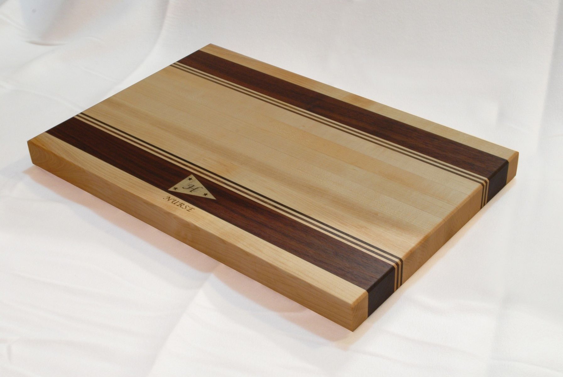 Maple Leaf Engraved Walnut Cutting Board without Handles