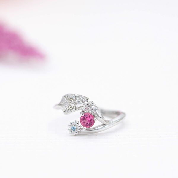 This feather and pink tourmaline ring is inspired by the anime Tsubasa Reservoir Chronicle.