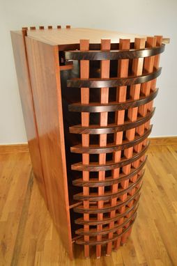Custom Made Stereo Cabinet Featuring Bent African Ribbon Sapele