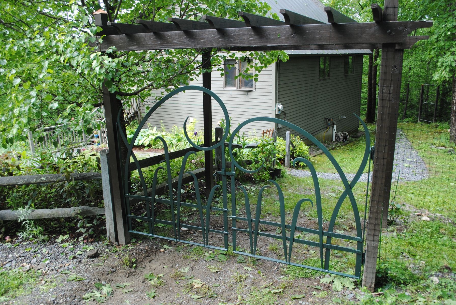 Custom Made Forged Iron Garden Gates by Mystic Metallurgy | CustomMade.com
