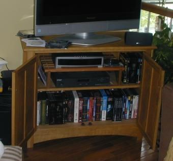 Custom Made Entertainment Center From Red & White Oak