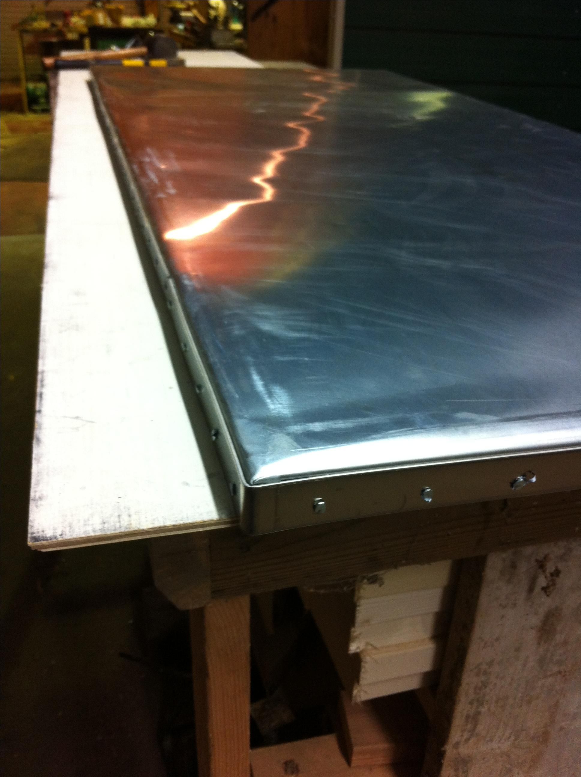 Buy Hand Crafted Zinc Table Top W/ Stainless Pinned Banding, made to order from The Stockton