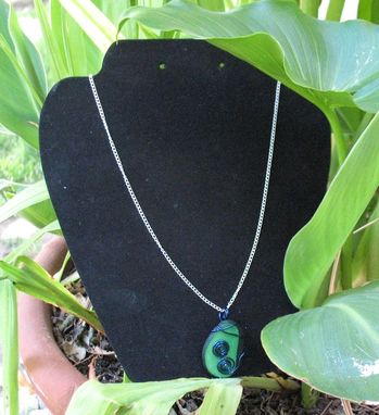 Custom Made Necklace: Blue Spirals On A Green Tagua Nut Slice