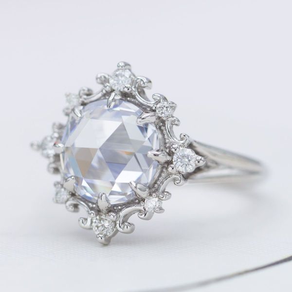 The rose cut diamond is the perfect center stone for an antique style engagement ring.