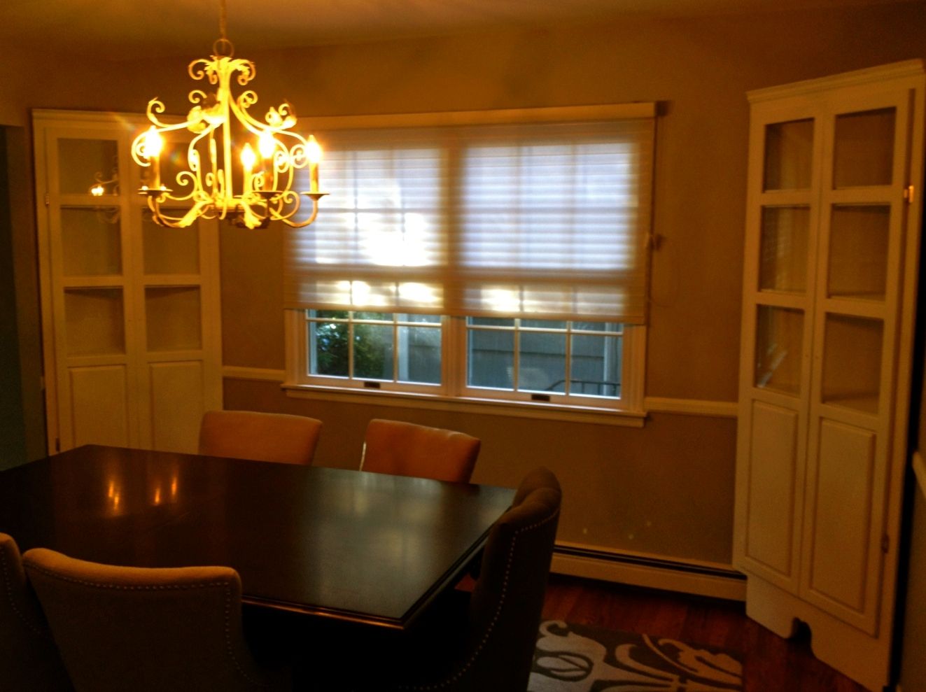 White corner cabinet dining room