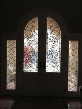 Custom Made Entry With Beveled Glass And Scalloped Field