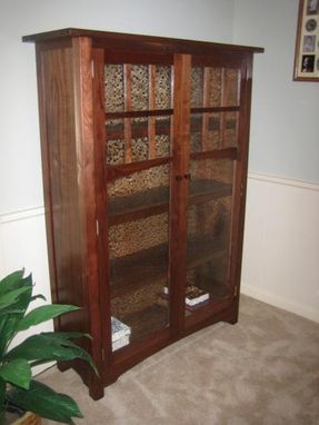 Custom Made Walnut Book Case With Glass Panel Doors.
