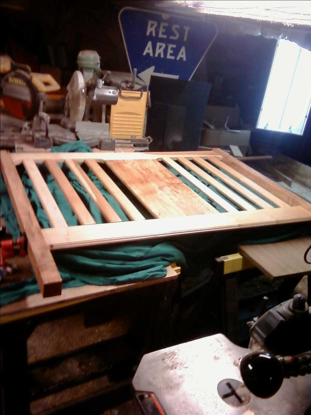 Custom Figured Maple Convertible Crib. by Cooper Woodworks