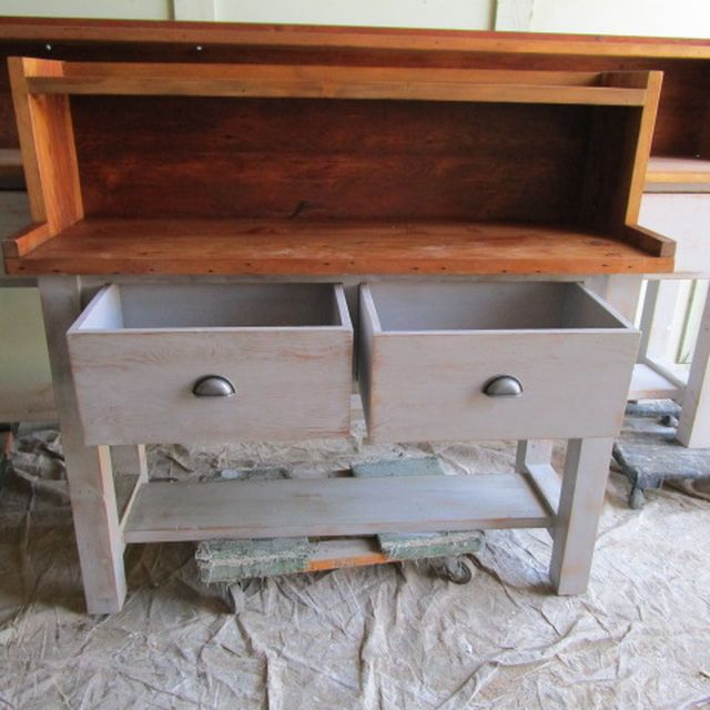 A Hand Crafted Kitchen Cabinet Made From Reclaimed Wood