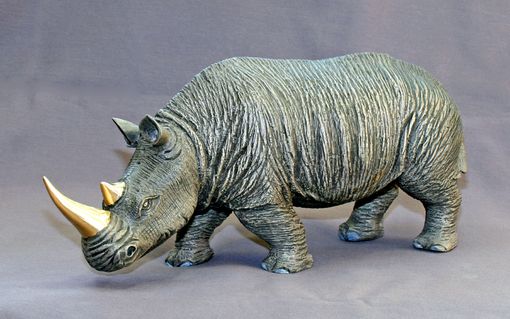 white rhino figurine