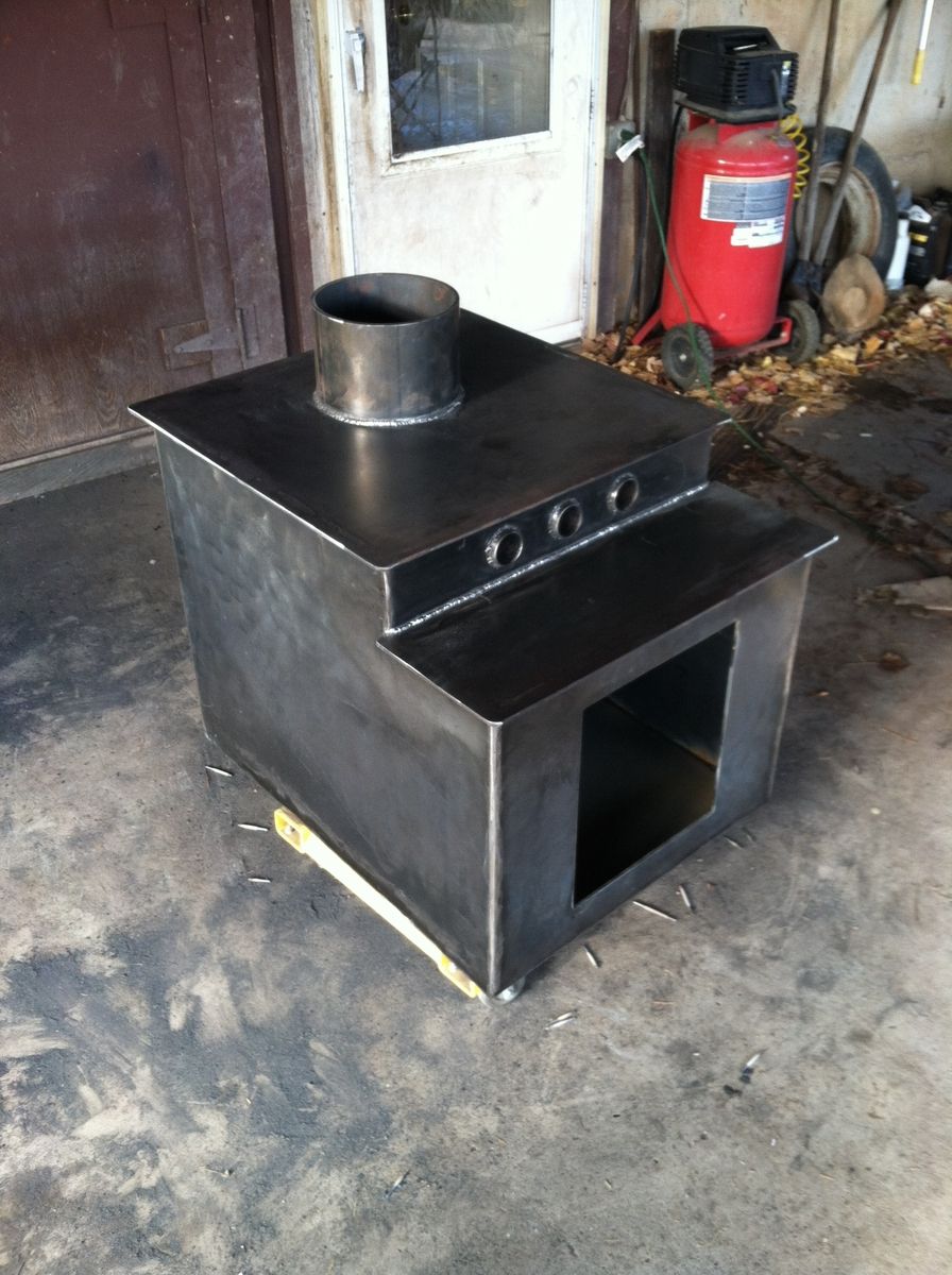 Hand Crafted Wood Stove by Crossroads Concrete