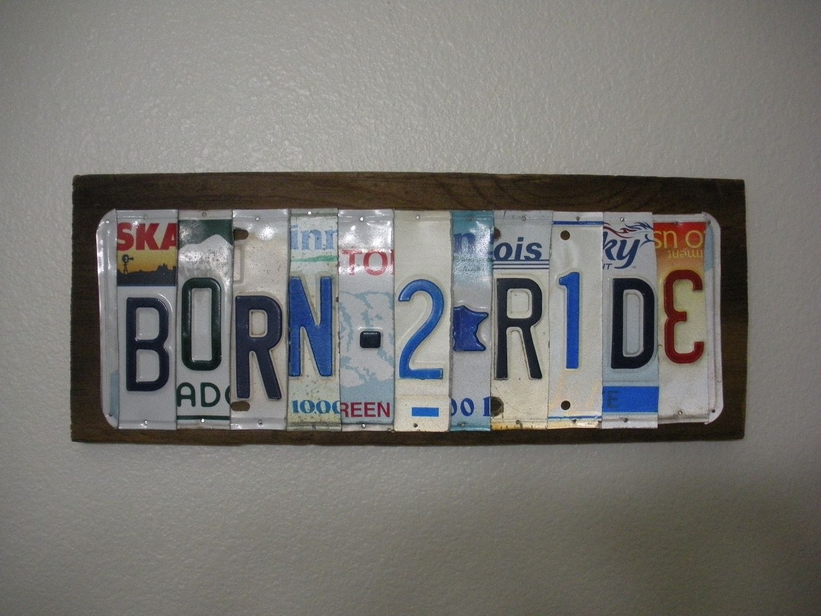 Hand Made Custom License Plate Signs by Grease Monkey Inc.